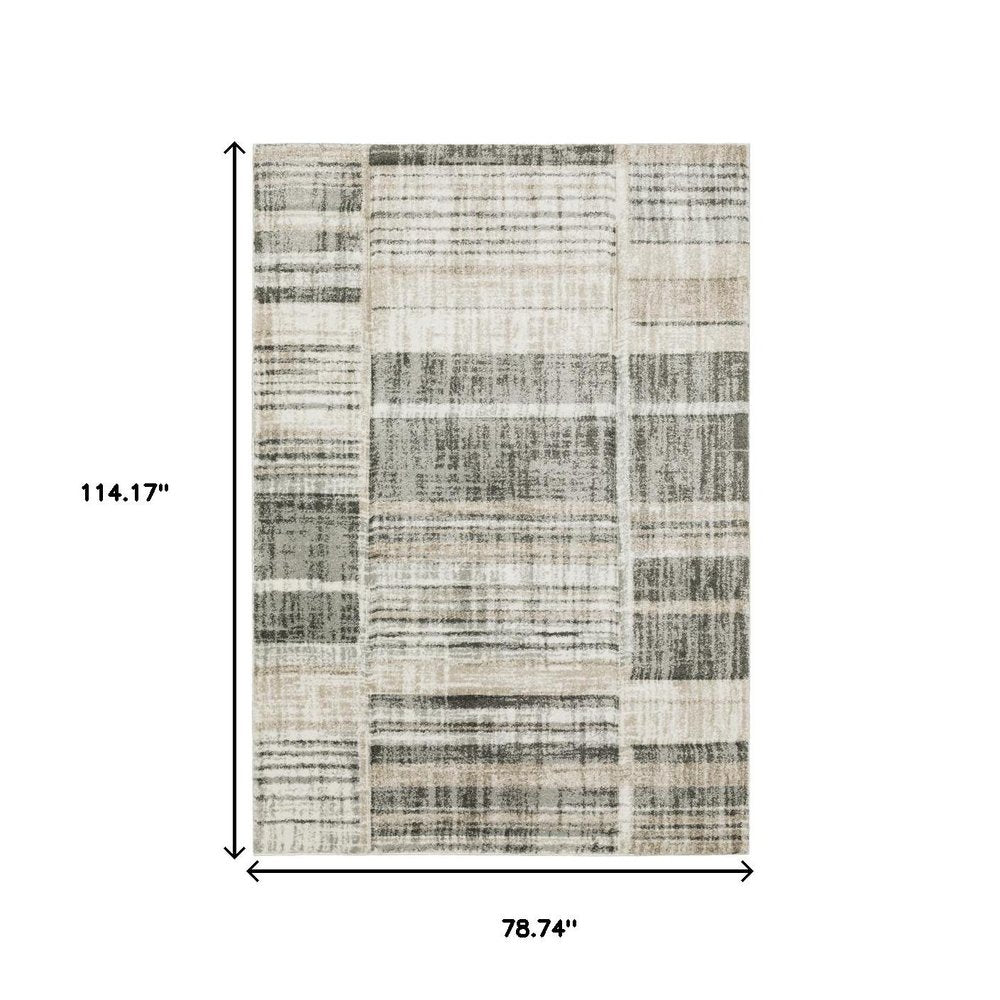 6' X 9' Grey Charcoal Ivory Tan Brown And Beige Geometric Power Loom Stain Resistant Area Rug