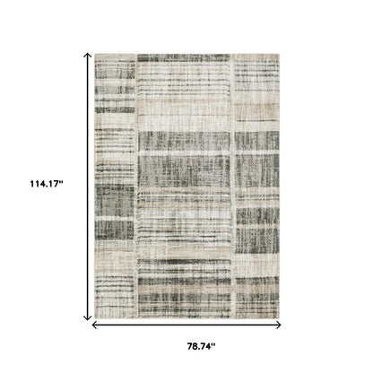 6' X 9' Grey Charcoal Ivory Tan Brown And Beige Geometric Power Loom Stain Resistant Area Rug