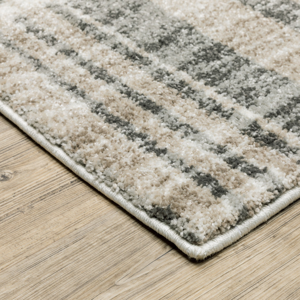 6' X 9' Grey Charcoal Ivory Tan Brown And Beige Geometric Power Loom Stain Resistant Area Rug