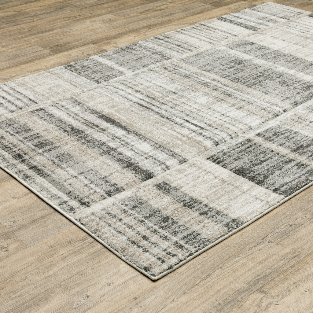 8' X 11' Grey Charcoal Ivory Tan Brown And Beige Geometric Power Loom Stain Resistant Area Rug