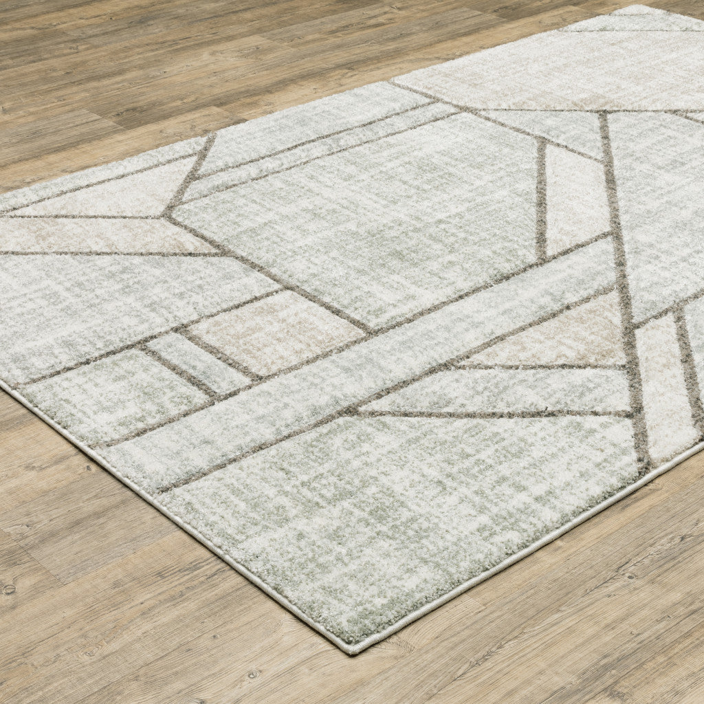 5' X 8' Gray And Ivory Geometric Power Loom Area Rug