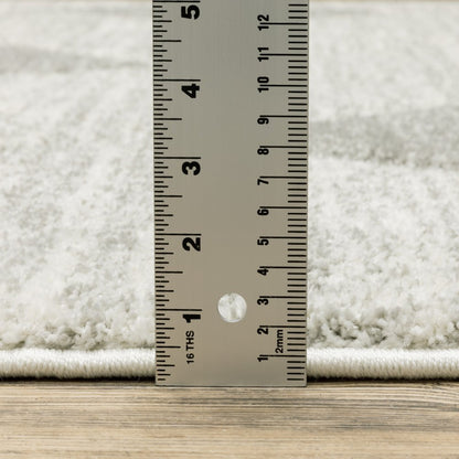 7' X 10' Gray And Ivory Geometric Area Rug