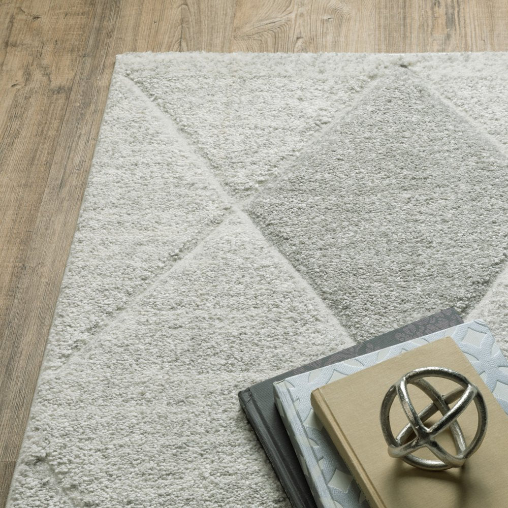 8' X 11' Gray And Ivory Geometric Area Rug