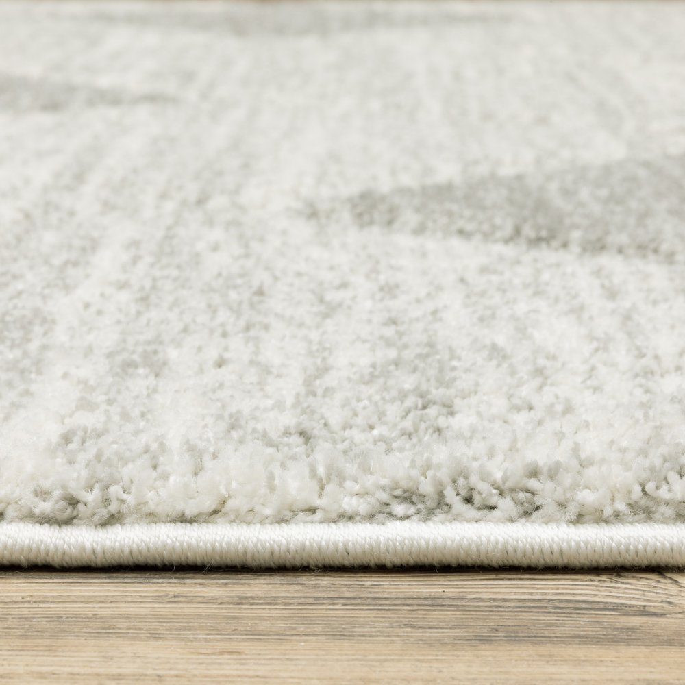 8' X 11' Gray And Ivory Geometric Area Rug