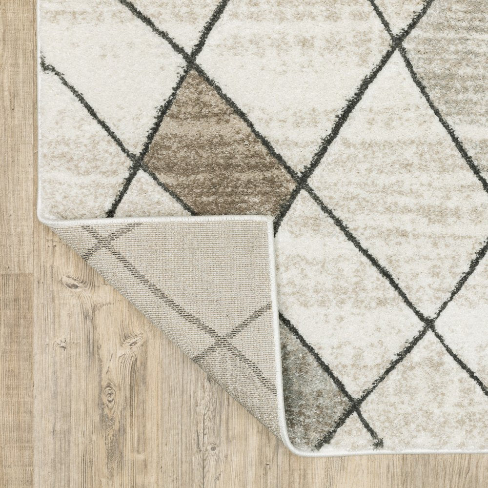 2' x 8' beige, grey, tan and brown geometric runner rug, stain resistant.