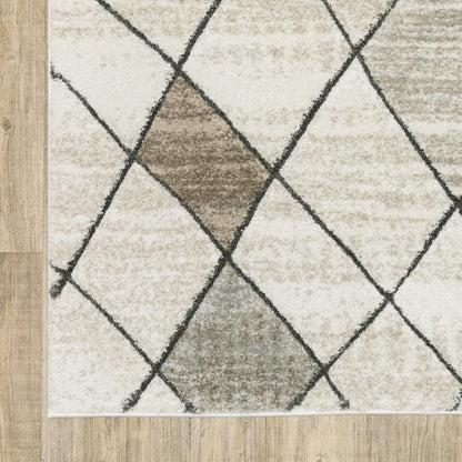 2' x 8' beige, grey, tan and brown geometric runner rug; power loom construction; stain resistant.