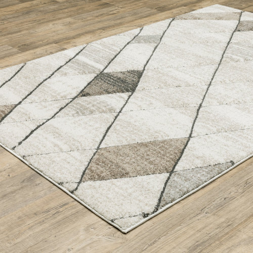 7' X 10' Beige And Gray Geometric Area Rug