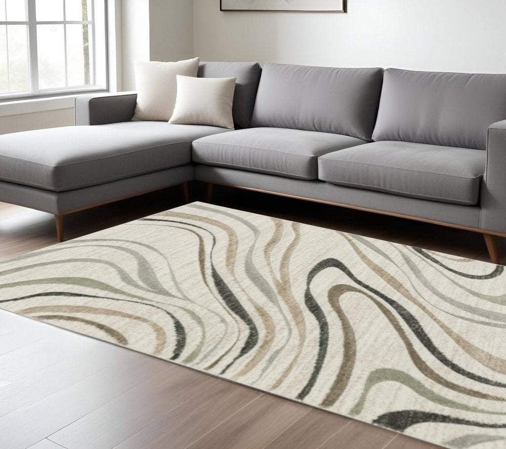 6' X 9' Beige Grey Brown Sage Pale Blue Tan And Charcoal Abstract Power Loom Stain Resistant Area Rug