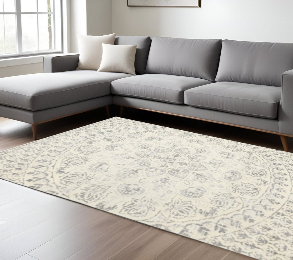 Product title: 10' X 13' Ivory And Grey Floral Power Loom Stain Resistant Area Rug
