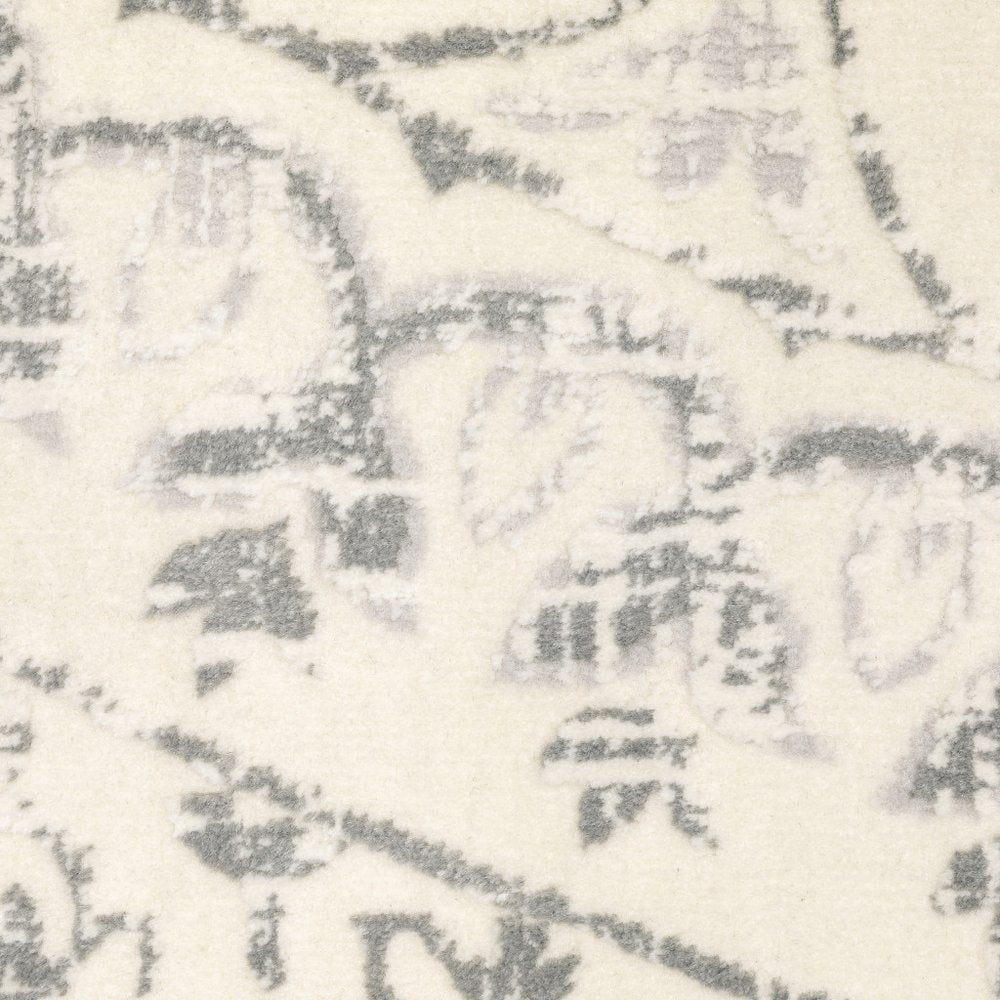 10' x 13' ivory and grey floral power loom stain-resistant area rug