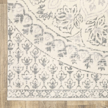 10' x 13' ivory and grey floral power loom stain resistant area rug