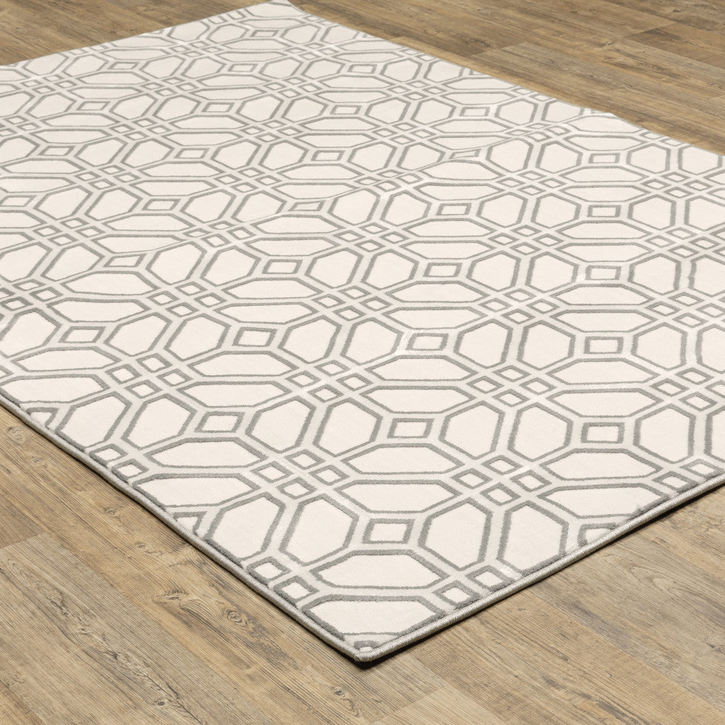 4' X 6' Ivory And Grey Geometric Power Loom Stain Resistant Area Rug