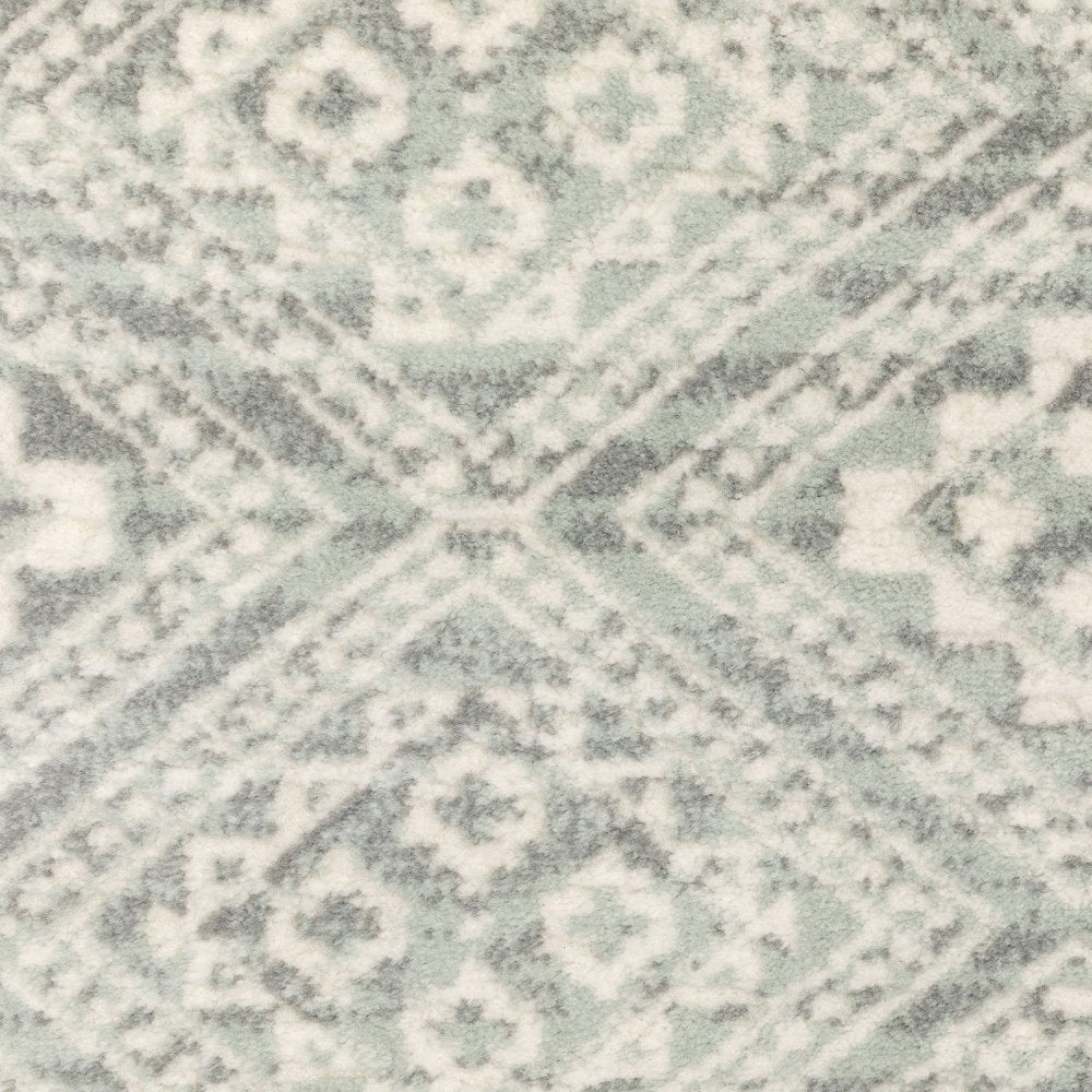 Soft light gray & gray geometric distressed area rug
