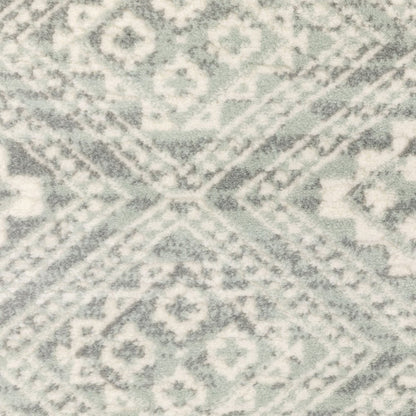 Soft light gray & gray geometric distressed area rug