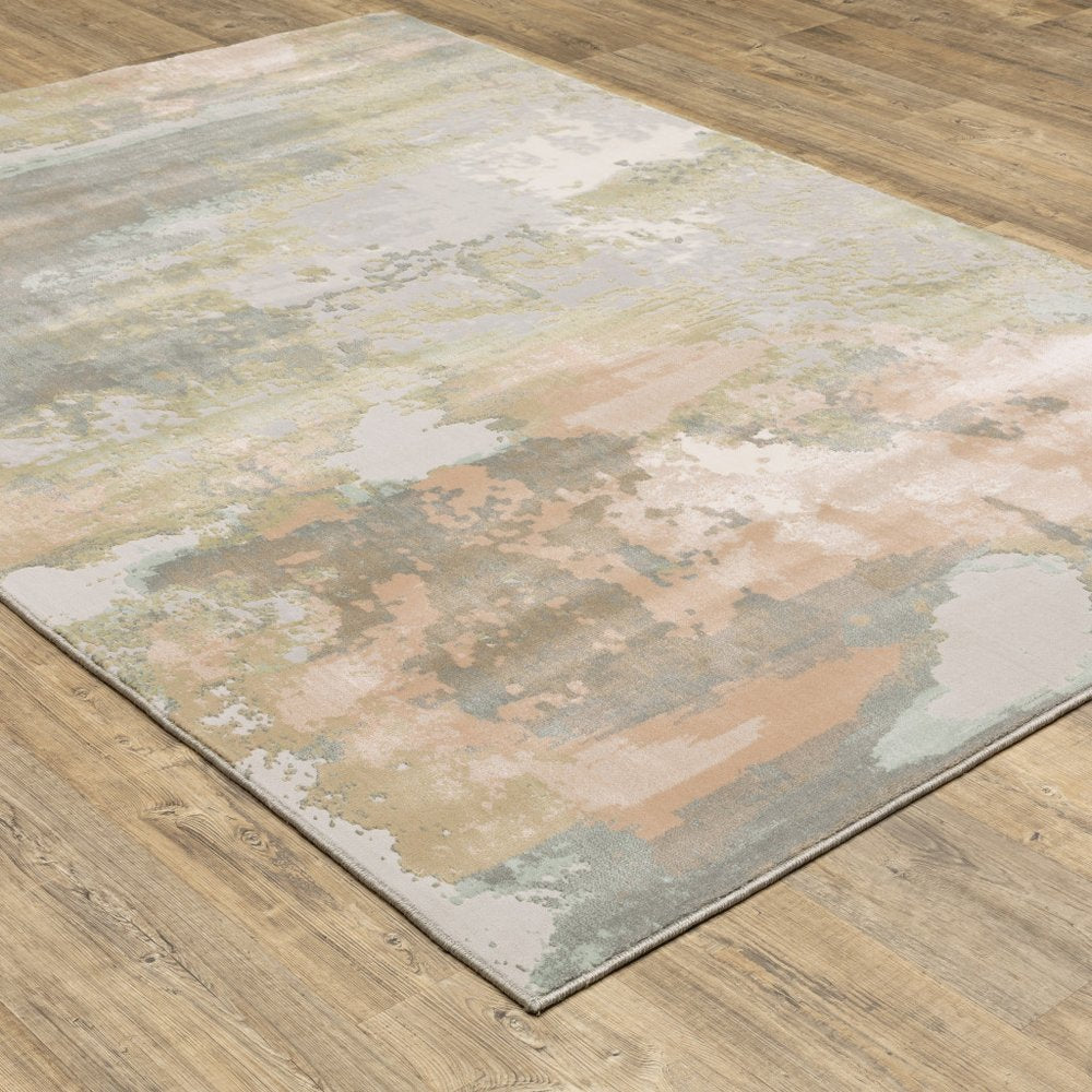 10' X 13' Pink And Cream Abstract Area Rug