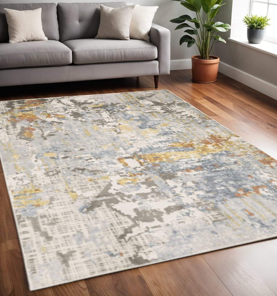 5' X 8' Grey Blue Beige Gold And Rust Abstract Power Loom Stain Resistant Area Rug