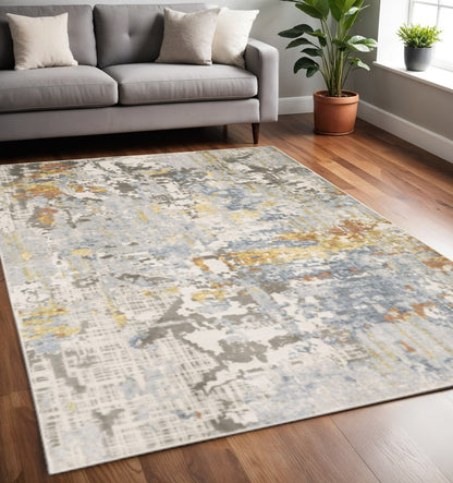 5' X 8' Grey Blue Beige Gold And Rust Abstract Power Loom Stain Resistant Area Rug