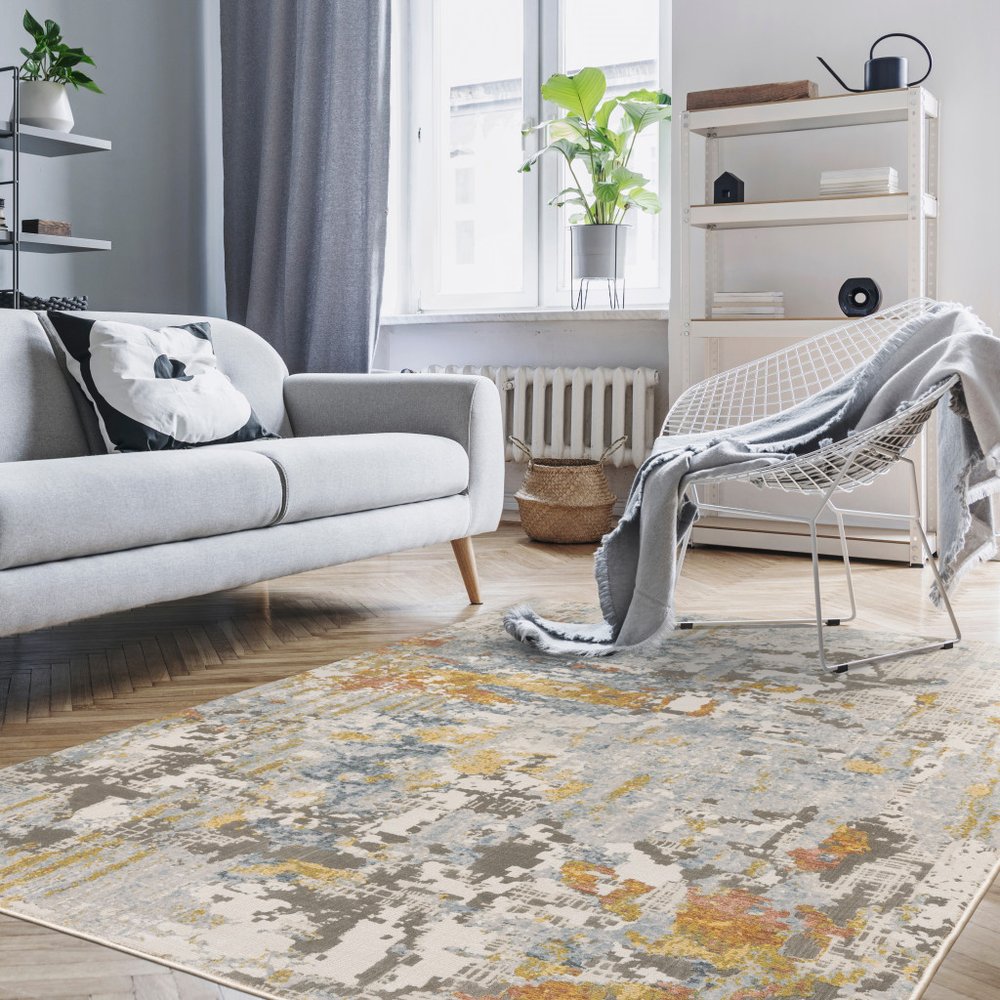 7' X 10' Beige And Blue Abstract Area Rug