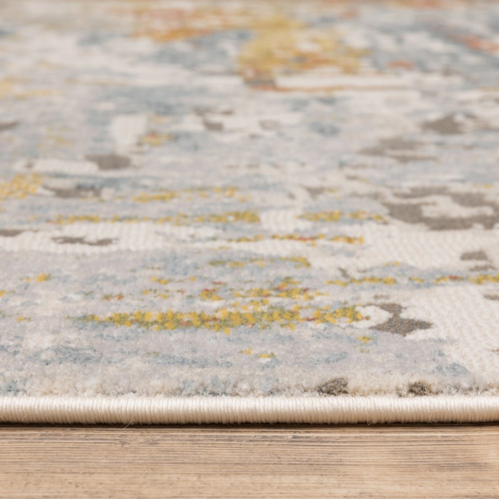 7' X 10' Beige And Blue Abstract Area Rug