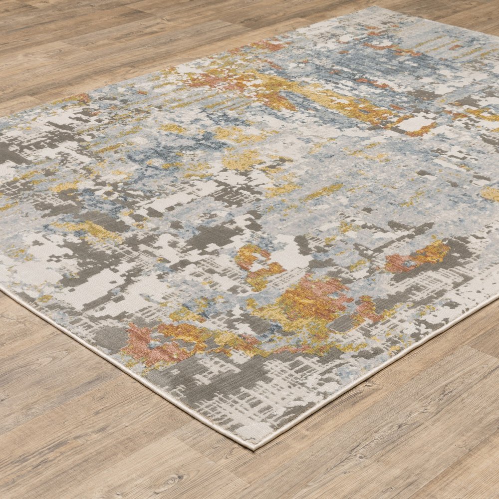 7' X 10' Beige And Blue Abstract Area Rug
