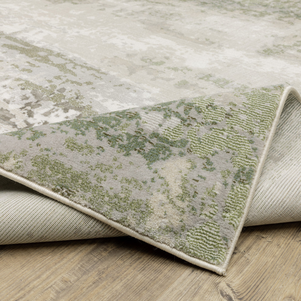 2' X 8' Beige Grey Brown And Sage Green Abstract Power Loom Stain Resistant Runner Rug