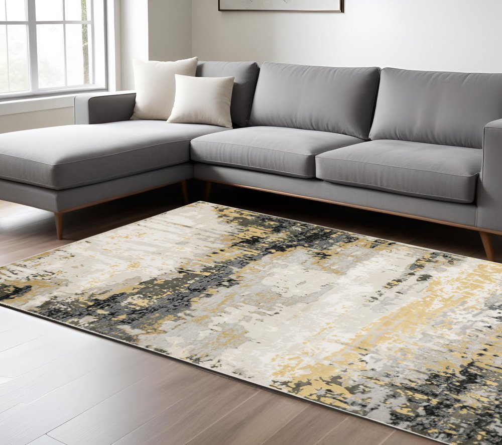 7' X 10' Beige And Gold Abstract Distressed Area Rug