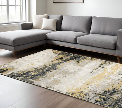 7' X 10' Beige And Gold Abstract Distressed Area Rug