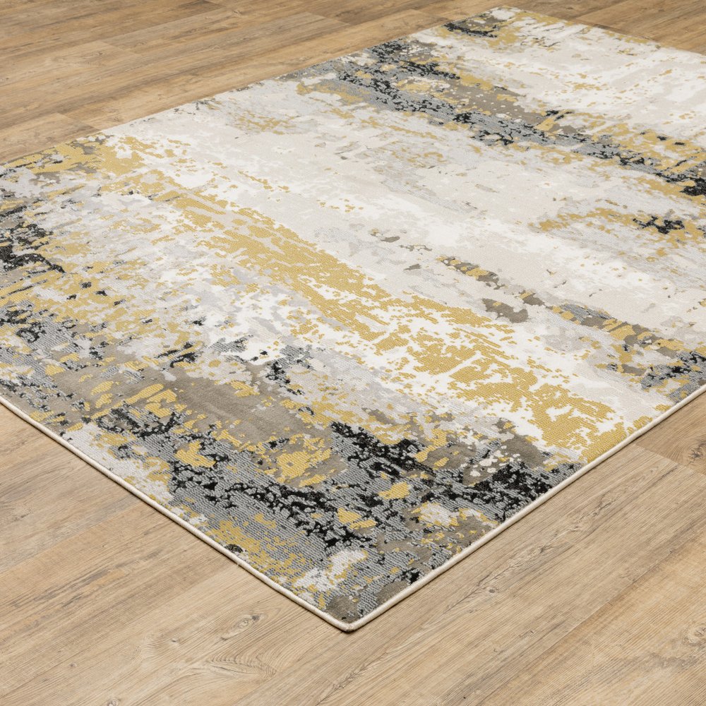 7' X 10' Beige And Gold Abstract Distressed Area Rug