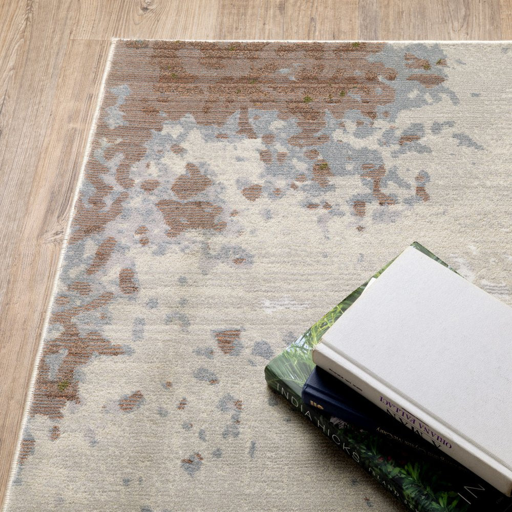 7' X 10' Beige And Pink Abstract Distressed Area Rug