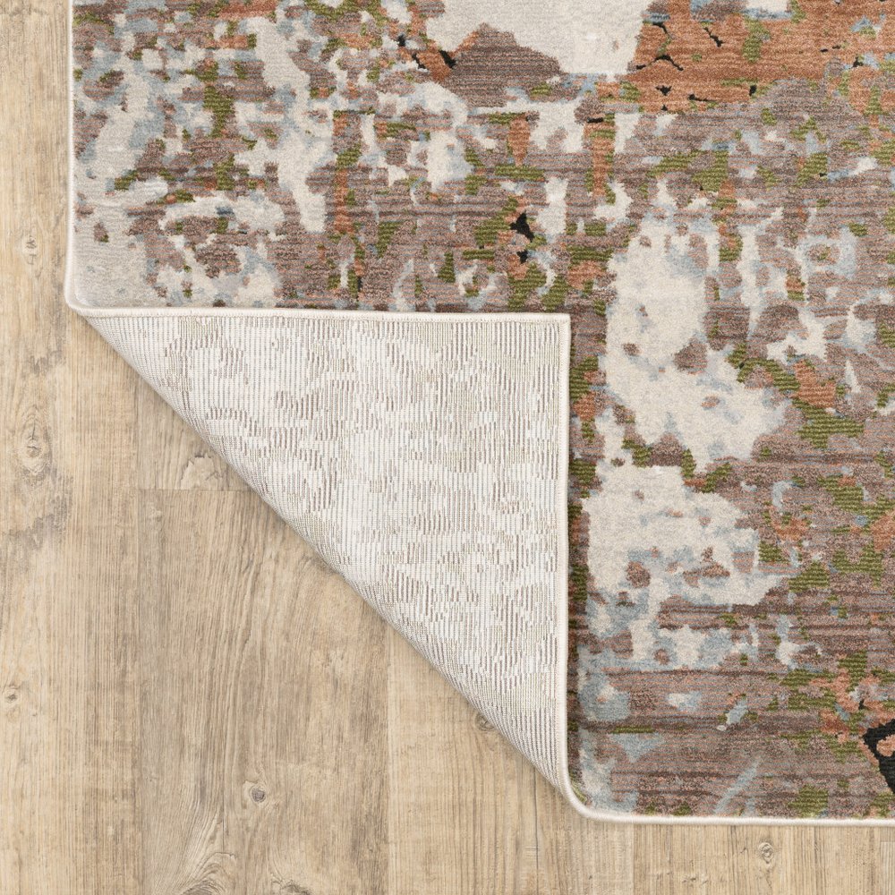 7' X 10' Beige And Pink Abstract Distressed Area Rug