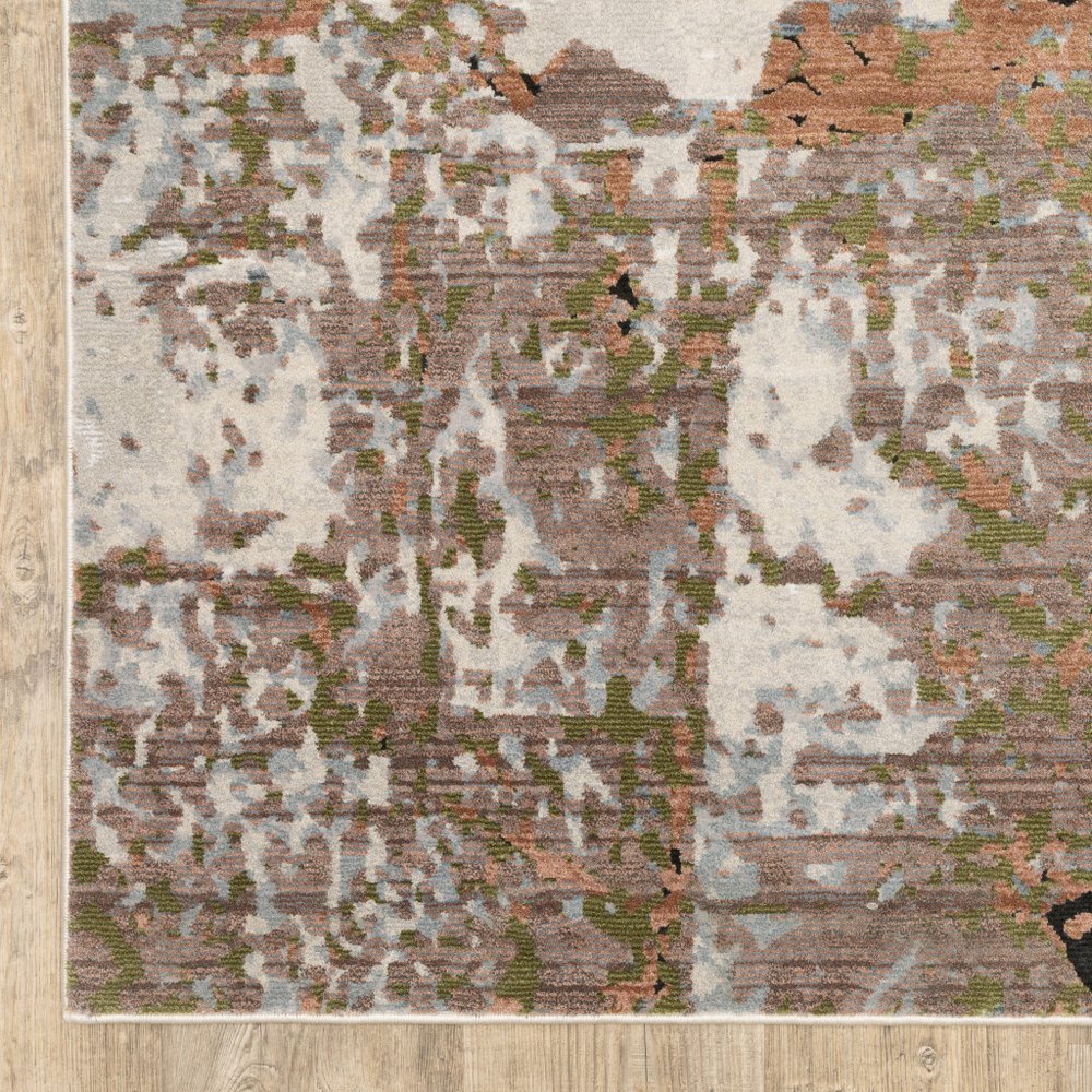 7' X 10' Beige And Pink Abstract Distressed Area Rug