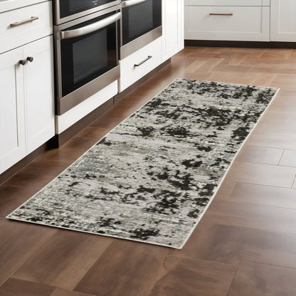 2' X 8' Grey Charcoal Black And Ivory Abstract Power Loom Stain Resistant Runner Rug