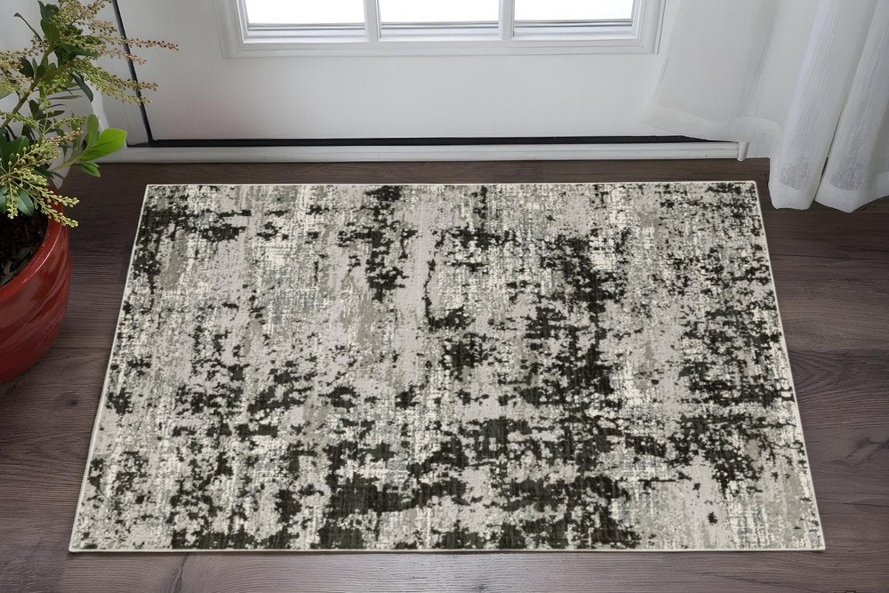 3' X 5' Grey Charcoal Black And Ivory Abstract Power Loom Stain Resistant Area Rug
