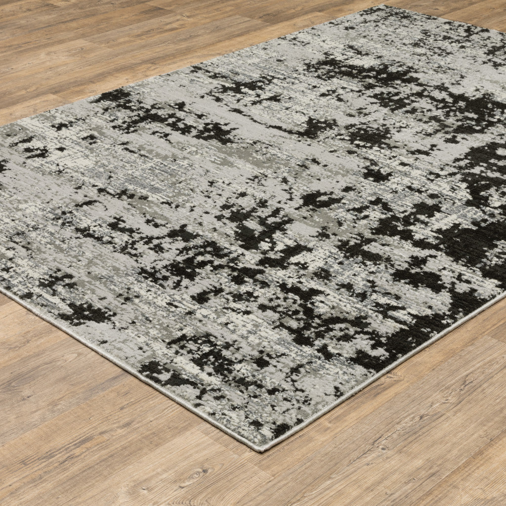 3' X 5' Grey Charcoal Black And Ivory Abstract Power Loom Stain Resistant Area Rug