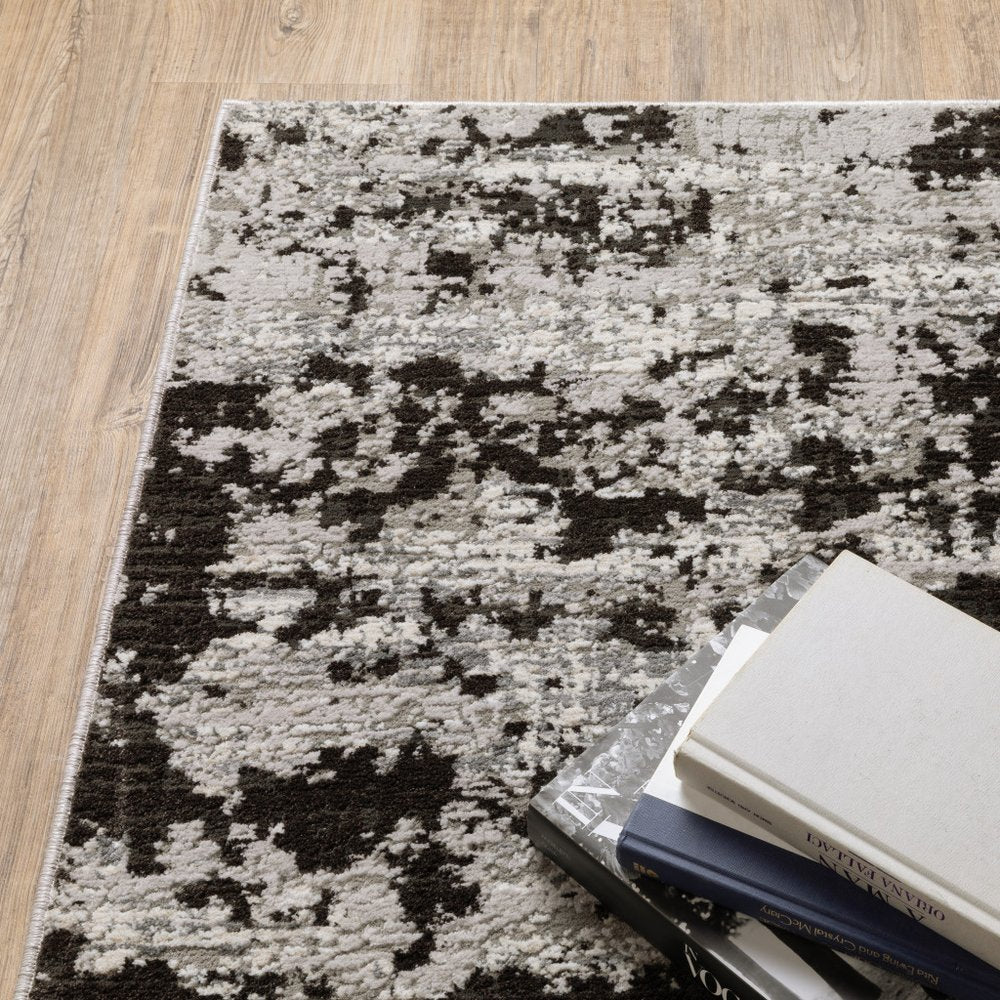 7' X 10' Gray And Black Abstract Distressed Area Rug