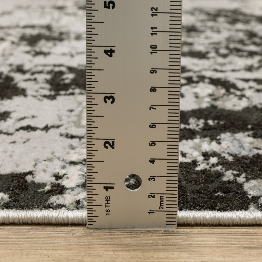 7' X 10' Gray And Black Abstract Distressed Area Rug