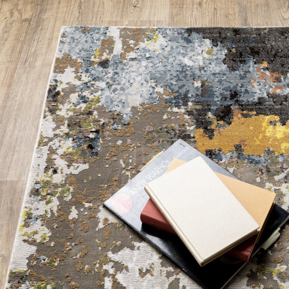 8' X 11' Beige Green And Orange Abstract Area Rug