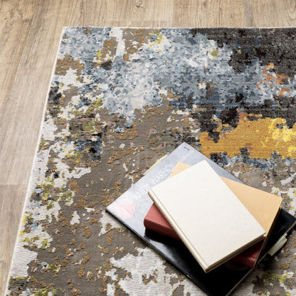 8' X 11' Beige Green And Orange Abstract Area Rug