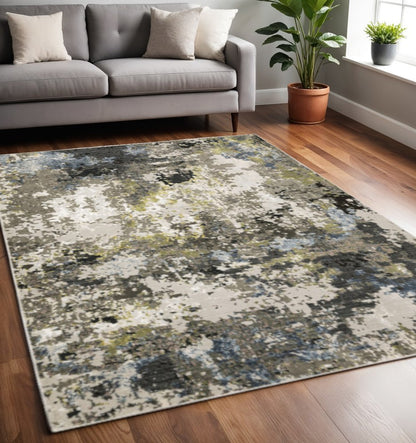 5' X 8' Grey Green Gold Blue And Beige Abstract Power Loom Stain Resistant Area Rug