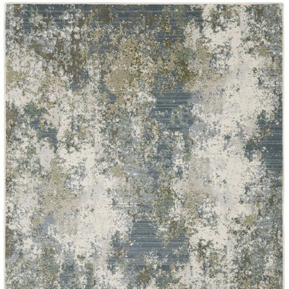 5' X 8' Blue Grey Green And Beige Abstract Power Loom Stain Resistant Area Rug