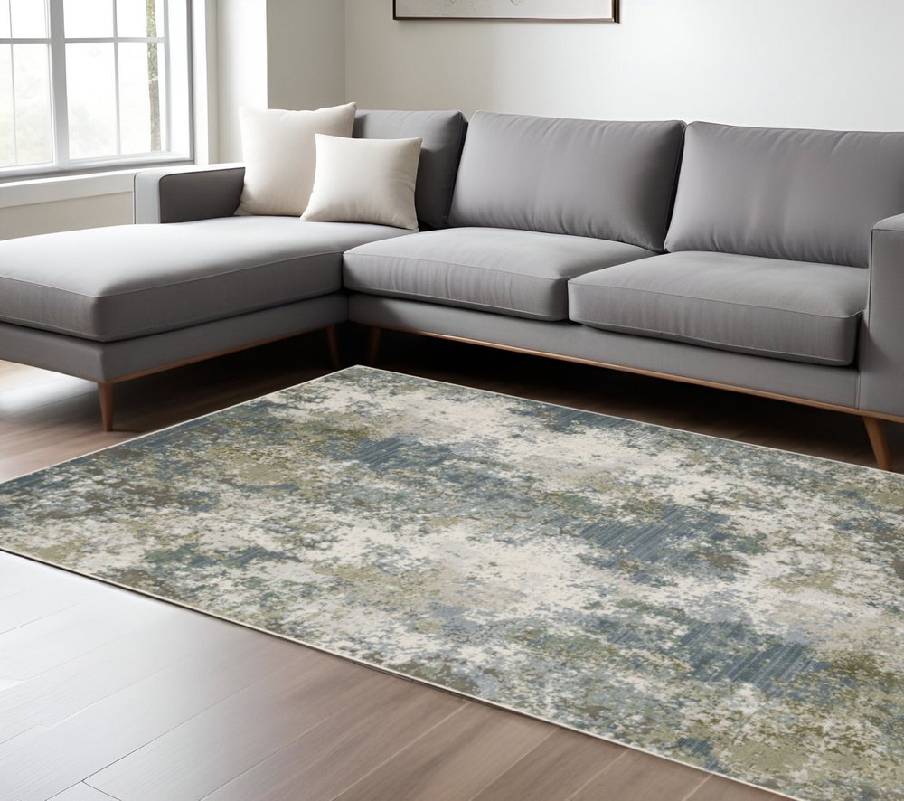 7' X 10' Blue And Green Abstract Area Rug