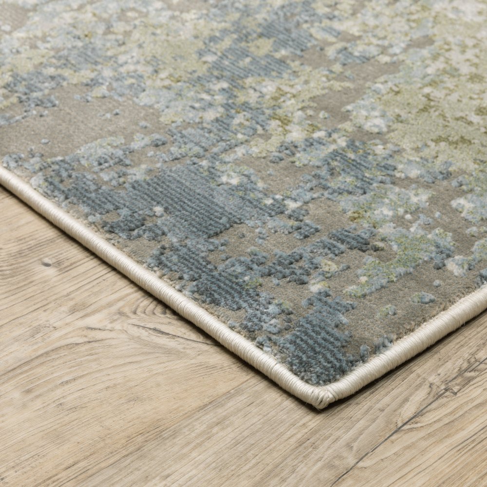7' X 10' Blue And Green Abstract Area Rug