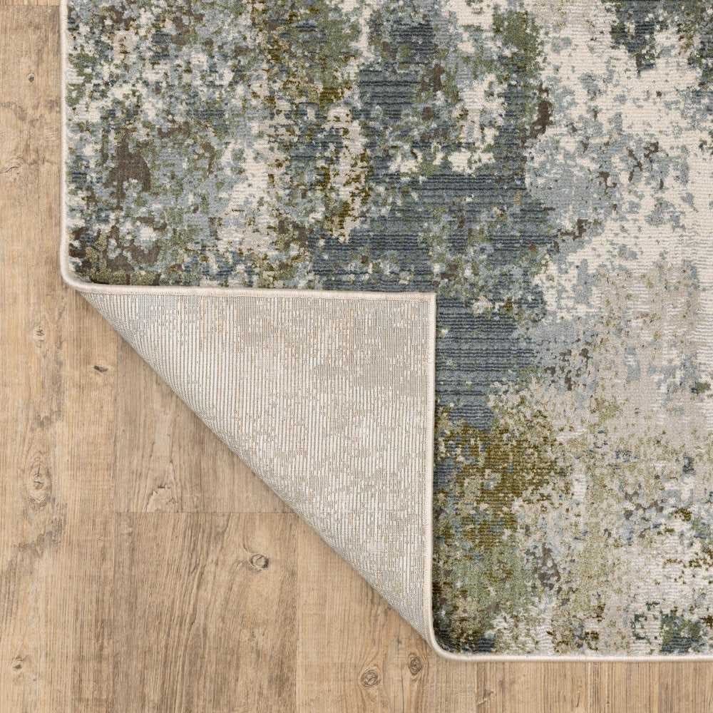 7' X 10' Blue And Green Abstract Area Rug