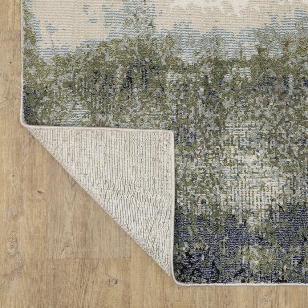 7' X 10' Blue And Green Abstract Area Rug