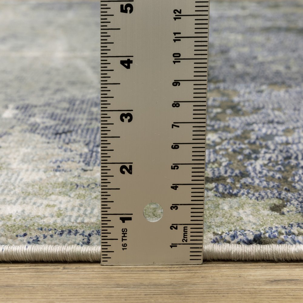 7' X 10' Blue And Green Abstract Area Rug