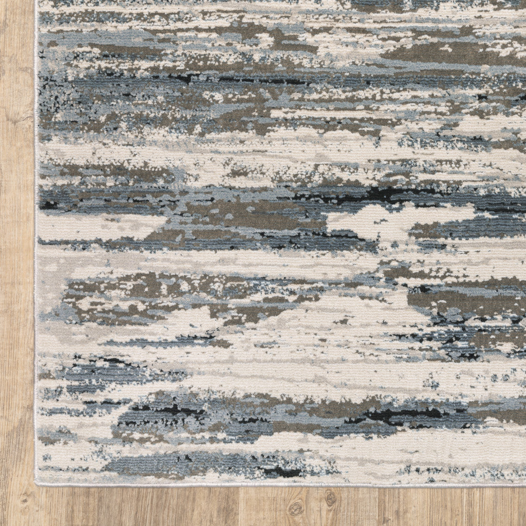 5' X 8' Blue Grey Beige And Brown Abstract Power Loom Stain Resistant Area Rug