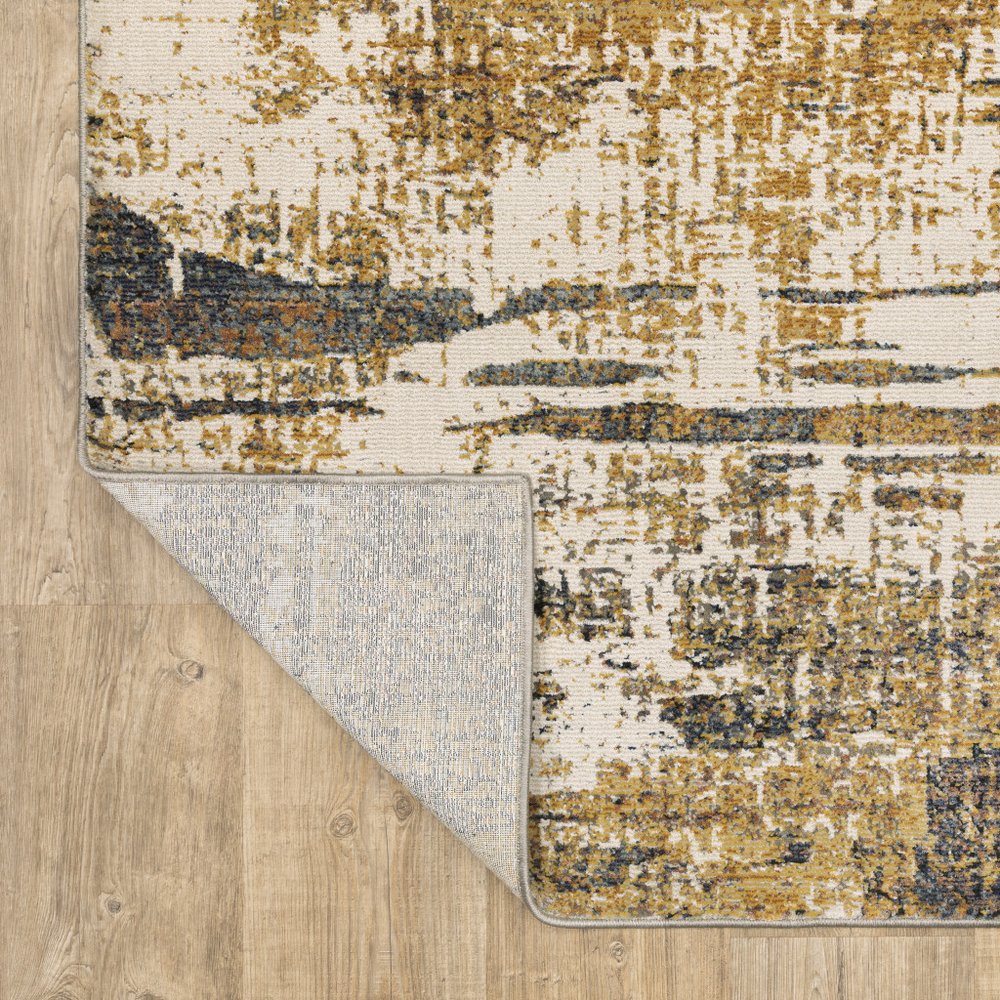 2' X 8' Gold Brown Rust Grey Blue And Beige Abstract Power Loom Stain Resistant Runner Rug