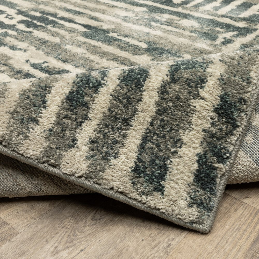 2' X 8' Blue And Beige Abstract Power Loom Stain Resistant Runner Rug