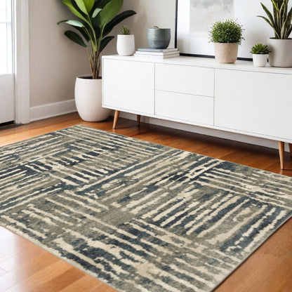 4' X 6' Blue And Beige Abstract Power Loom Stain Resistant Area Rug