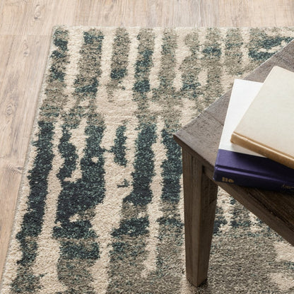 4' X 6' Blue And Beige Abstract Power Loom Stain Resistant Area Rug